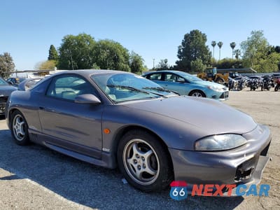 Czwarte zdjęcie samochodu z boku: 1997 MITSUBISHI ECLIPSE GST VIN:4A3AK54F6VE171899 - miniatura