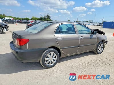 Trzecie zdjęcie samochodu z tyłu: 2003 TOYOTA COROLLA CE VIN:1NXBR32E83Z097613 - miniatura