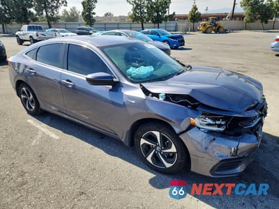 Czwarte zdjęcie samochodu z boku: 2022 HONDA INSIGHT EX VIN:19XZE4F55NE006989 - miniatura