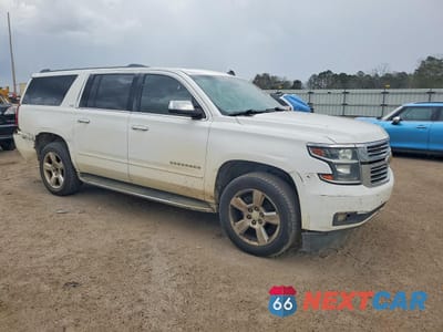 Czwarte zdjęcie samochodu z boku: 2015 CHEVROLET SUBURBAN C1500 LTZ VIN:1GNSCKKCXFR229316 - miniatura
