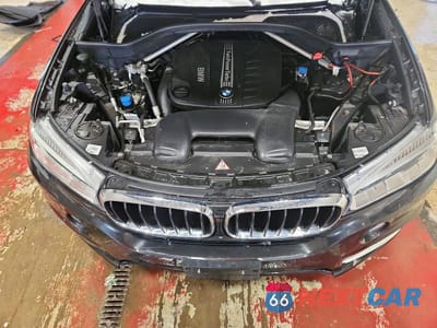 Zdjęcie 12 z 13 samochodu: 2014 BMW X5 XDRIVE35D VIN:5UXKS4C50E0J93743 - miniatura