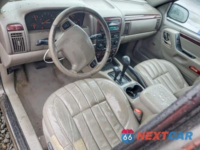 Zdjęcie 8 z 13 samochodu: 2000 JEEP GRAND CHEROKEE LIMITED VIN:1J4GW58N5YC397476 - miniatura