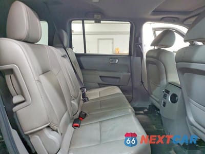 Zdjęcie 11 z 13 samochodu: 2012 HONDA PILOT EXL VIN:5FNYF4H5XCB501752 - miniatura