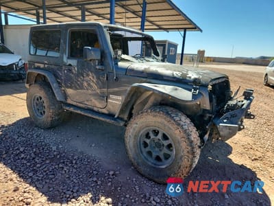 Czwarte zdjęcie samochodu z boku: 2017 JEEP WRANGLER SPORT VIN:1C4AJWAG8HL720480 - miniatura