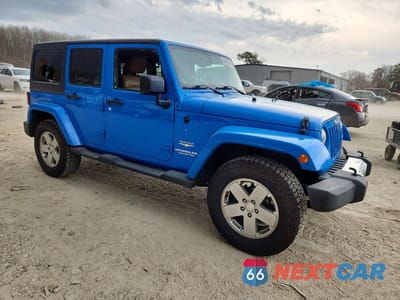 Czwarte zdjęcie samochodu z boku: 2011 JEEP WRANGLER UNLIMITED SAHARA VIN:1J4HA5H12BL632987 - miniatura