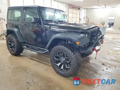 Czwarte zdjęcie samochodu z boku: 2018 JEEP WRANGLER SPORT VIN:1C4AJWAG4JL868857 - miniatura