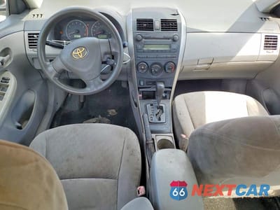 Zdjęcie 8 z 11 samochodu: 2009 TOYOTA COROLLA LE VIN:JTDBL40E699075023 - miniatura