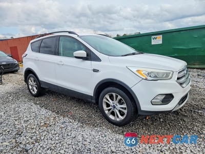 Czwarte zdjęcie samochodu z boku: 2017 FORD ESCAPE SE VIN:1FMCU9GD6HUC03943 - miniatura