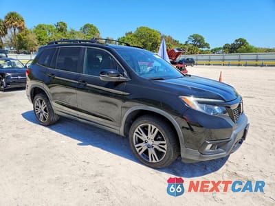 Czwarte zdjęcie samochodu z boku: 2019 HONDA PASSPORT EXL VIN:5FNYF8H51KB010590 - miniatura