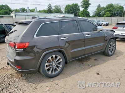 Trzecie zdjęcie samochodu z tyłu: 2017 JEEP GRAND CHEROKEE OVERLAND VIN:1C4RJFCG0HC699995 - miniatura