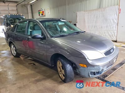 Czwarte zdjęcie samochodu z boku: 2007 FORD FOCUS ZX4 VIN:1FAHP34N87W193341 - miniatura