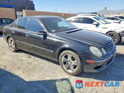 Czwarte zdjęcie samochodu z boku: 2003 MERCEDES-BENZ E 320 VIN:WDBUF65J83A140492 - miniatura