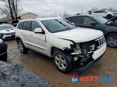 Czwarte zdjęcie samochodu z boku: 2011 JEEP GRAND CHEROKEE LAREDO VIN:1J4RR4GG1BC656226 - miniatura