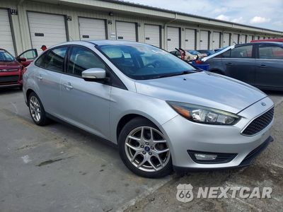 Czwarte zdjęcie samochodu z boku: 2015 FORD FOCUS SE VIN:1FADP3F22FL361086 - miniatura