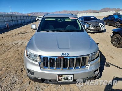 Piąte zdjęcie samochodu w środku: 2013 JEEP GRAND CHEROKEE LAREDO VIN:1C4RJEAGXDC620971 - miniatura