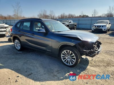 Czwarte zdjęcie samochodu z boku: 2015 BMW X1 XDRIVE28I VIN:WBAVL1C50FVY29508 - miniatura