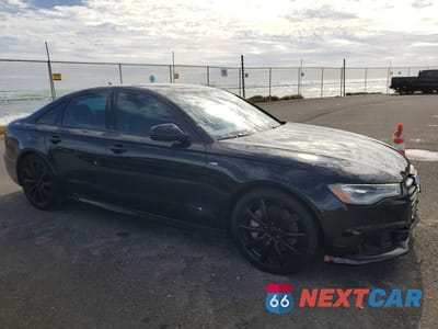 Czwarte zdjęcie samochodu z boku: 2018 AUDI A6 PREMIUM VIN:WAUC8AFC2JN062417 - miniatura
