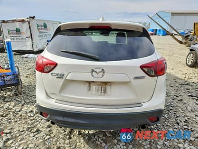 Zdjęcie 6 z 12 samochodu: 2014 MAZDA CX-5 TOURING VIN:JM3KE4CY9E0330835 - miniatura