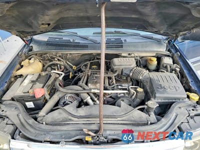 Zdjęcie 11 z 11 samochodu: 2001 JEEP GRAND CHEROKEE LAREDO VIN:1J4GW48S61C590371 - miniatura