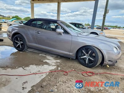 Czwarte zdjęcie samochodu z boku: 2009 BENTLEY CONTINENTAL GTC VIN:SCBDR33W79C060249 - miniatura