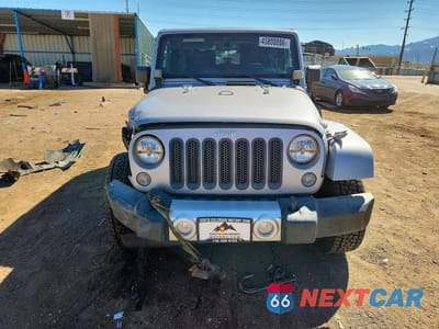 Piąte zdjęcie samochodu w środku: 2014 JEEP WRANGLER SAHARA VIN:1C4AJWBG9EL175612 - miniatura