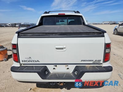 Zdjęcie 6 z 12 samochodu: 2013 HONDA RIDGELINE SPORT VIN:5FPYK1F73DB012245 - miniatura