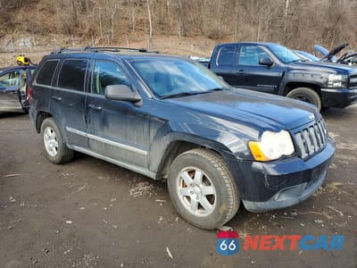 Czwarte zdjęcie samochodu z boku: 2010 JEEP GRAND CHEROKEE LAREDO VIN:1J4PR4GK0AC104159 - miniatura