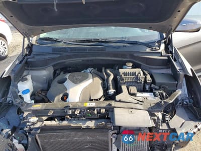 Zdjęcie 12 z 13 samochodu: 2014 HYUNDAI SANTA FE SPORT 2.0T VIN:5XYZU3LA7EG185229 - miniatura