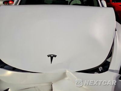 Zdjęcie 12 z 14 samochodu: 2022 TESLA MODEL Y VIN:7SAYGAEE1NF548190 - miniatura