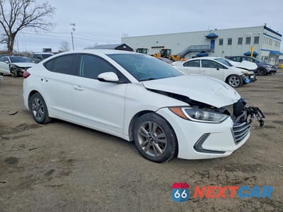 Czwarte zdjęcie samochodu z boku: 2018 HYUNDAI ELANTRA GL 4DR VIN:KMHD84LF2JU448702 - miniatura