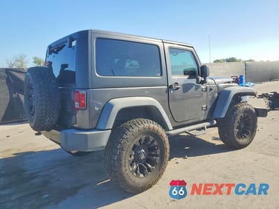 Trzecie zdjęcie samochodu z tyłu: 2017 JEEP WRANGLER SPORT VIN:1C4AJWAG4HL657605 - miniatura