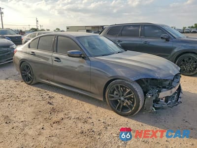 Czwarte zdjęcie samochodu z boku: 2021 BMW 330I VIN:3MW5R1J05M8C01997 - miniatura