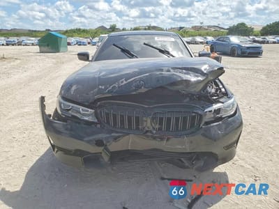 Piąte zdjęcie samochodu w środku: 2021 BMW 330I VIN:3MW5R1J04M8B88661 - miniatura