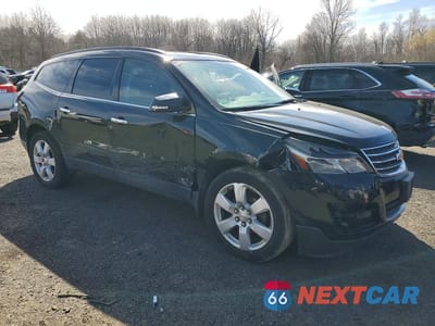 Czwarte zdjęcie samochodu z boku: 2017 CHEVROLET TRAVERSE LT VIN:1GNKVGKD2HJ295991 - miniatura