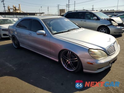 Czwarte zdjęcie samochodu z boku: 2002 MERCEDES-BENZ S 600 VIN:WDBNG78J82A228458 - miniatura