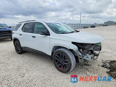 Czwarte zdjęcie samochodu z boku: 2021 CHEVROLET TRAVERSE PREMIER VIN:1GNERKKW2MJ122147 - miniatura
