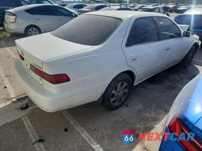 Trzecie zdjęcie samochodu z tyłu: 1997 TOYOTA CAMRY CE VIN:4T1BF22K4VU036819 - miniatura