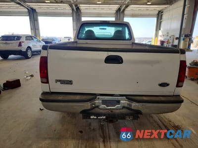 Zdjęcie 6 z 12 samochodu: 2003 FORD F250 SUPER DUTY VIN:1FTNF21L23EA48695 - miniatura
