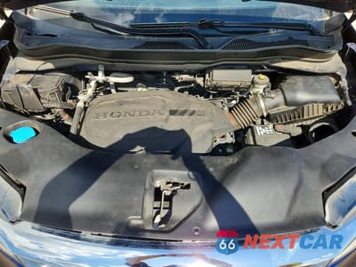 Zdjęcie 12 z 14 samochodu: 2022 HONDA PILOT TOURING VIN:5FNYF5H65NB002911 - miniatura