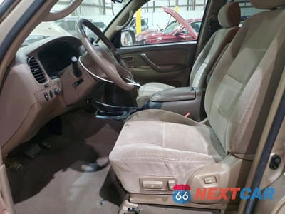 Zdjęcie 7 z 13 samochodu: 2002 TOYOTA SEQUOIA SR5 VIN:5TDBT44A62S134389 - miniatura