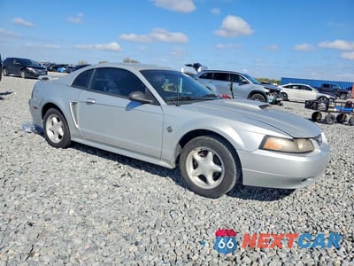 Czwarte zdjęcie samochodu z boku: 2004 FORD MUSTANG VIN:1FAFP406X4F151633 - miniatura