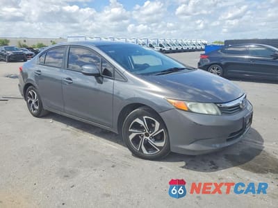 Czwarte zdjęcie samochodu z boku: 2012 HONDA CIVIC LX VIN:19XFB2F52CE326624 - miniatura