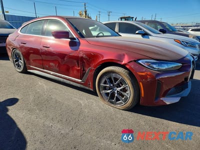 Czwarte zdjęcie samochodu z boku: 2023 BMW I4 EDRIVE 35 VIN:WBY43AW04PFR35646 - miniatura