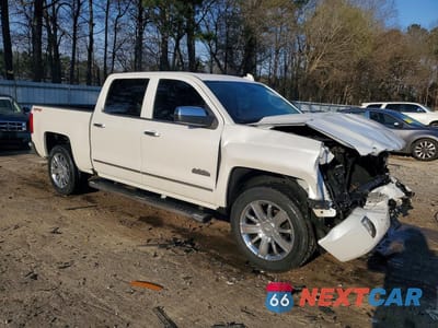 Czwarte zdjęcie samochodu z boku: 2016 CHEVROLET SILVERADO K1500 HIGH COUNTRY VIN:3GCUKTEC0GG253647 - miniatura