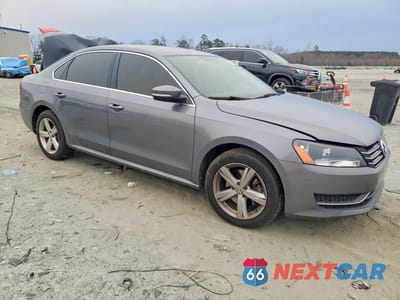 Czwarte zdjęcie samochodu z boku: 2014 VOLKSWAGEN PASSAT SE VIN:1VWBS7A36EC101440 - miniatura