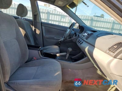 Zdjęcie 7 z 12 samochodu: 2002 TOYOTA CAMRY LE VIN:JTDBE32K720101601 - miniatura