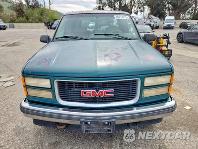 Piąte zdjęcie samochodu w środku: 1996 GMC SUBURBAN K1500 VIN:1GKFK16R2TJ733816 - miniatura