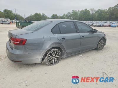 Trzecie zdjęcie samochodu z tyłu: 2018 VOLKSWAGEN JETTA SE VIN:3VWDB7AJ3JM222989 - miniatura