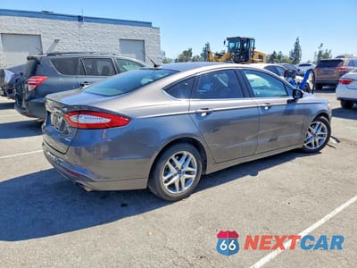 Trzecie zdjęcie samochodu z tyłu: 2013 FORD FUSION SE VIN:3FA6P0HR8DR299290 - miniatura