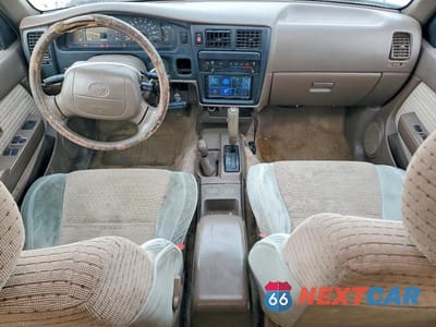 Zdjęcie 8 z 11 samochodu: 1997 TOYOTA TACOMA SR5 VIN:4TAWN74N9VZ297682 - miniatura